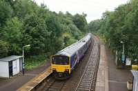 A Manchester Piccadilly to Buxton service runs non-stop through Middlewood station on 03 September 2017. The photo was taken from the bridge that used to carry the Macclesfield to Marple line and is now the Middlewood Way bridleway.<br><br>[John McIntyre 03/09/2017]
