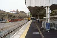 A view north along the recently re-instated platform 5 at Bolton, with a Manchester to Blackpool service waiting to depart on 18 September 2017. Platform 4 is presently out of use undergoing rebuilding.<br><br>[John McIntyre 18/09/2017]