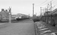 The Angus Railway Group's 'Five Counties' railtour of 20 April 1974 enters Ladybank from the Newburgh line, a year before the route reopened to passenger traffic.<br><br>[Bill Roberton 20/04/1974]