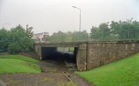 View north of Easthouses Road showing the bridge built when the Newbattle Collieries Railway was re-aligned. The Easthouses Extension Pit was just beyond on the right.<br><br>[Ewan Crawford //2002]