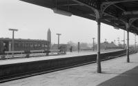 Dunfermline Lower station with the 'Angus Railway Group's 'Five Counties' railtour at the outer face of the island platform, since taken out of use and track lifted.<br><br>[Bill Roberton 20/04/1974]