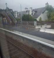 View from the window of a train at Kingussie. The far platform (southbound) has been raised for IEPs.<br><br>[John Yellowlees 07/09/2017]
