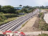 View west from the recently constructed overbridge at the new Forres station showing the extended loop serving the new station and existing alignment curving off to the left. Due to be connected up properly in mid October 2017. Photograph taken during an organised visit.<br><br>[Douglas Blades 29/08/2017]