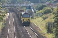 The Chirk Kronospan) to Baglan Bay empties passing through Pyle staion with Colas Rail 70806. To the right of the loco was Pyle West Jct, which formed part of the triangle of the Porthcawl branch at Pyle.<br>
<br>
<br><br>[Alastair McLellan 15/09/2017]