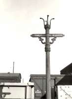 'Canal Wharf' sign on the platform at Johnstone (then Johnstone High) station in September 1957. [Ref query 14 September 2017] <br><br>[G H Robin collection by courtesy of the Mitchell Library, Glasgow 14/09/1957]