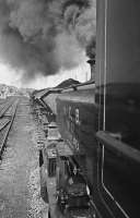 Fireman's view of NCB 0-4-0ST No.10, taking a run at the gradient, leaving Waterside for the Cutler tip with tippler wagons of waste from the washer trailing behind in 1975. <br>
<br><br>[Bill Roberton 12/08/1975]