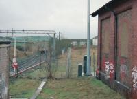 A 303 reaches the end of its journey at Neilston and changes tracks. The goods shed is on the right. This was approached from the location of the train.<br><br>[Ewan Crawford //1998]