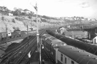 <h4><a href='/locations/H/Hawick_2nd'>Hawick [2nd]</a></h4><p><small><a href='/companies/B/Border_Union_Railway_North_British_Railway'>Border Union Railway (North British Railway)</a></small></p><p>The much photographed RCTS <I>Farewell to the Waverley Route</I> railtour about to leave Hawick on Sunday 5 January 1969 behind Deltic D9007 <I>Pinza</I>. The station pilot, Clayton D8606 stands over on the left, while the the 11.55 (Sunday only) ex-Edinburgh Waverley DMU is arriving at the up platform on the right.</p><p>05/01/1969<br><small><a href='/contributors/Bruce_McCartney'>Bruce McCartney</a></small></p>