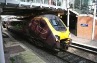 The 0900 Glasgow Central – Penzance CrossCountry Voyager passes below the Waverley cross-station walkway before drawing to a halt alongside platform 9(E) on 13 July 2017.<br><br>[John Furnevel 13/07/2017]