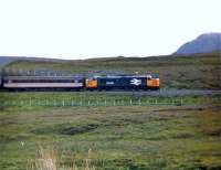Class 37  37421 heading for Inverness near Achnasheen<br><br>[Gordon Steel 23/08/1987]
