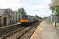 A light engine movement from the National Railway Museum to Carnforth on 16th September 2017. West Coast Railway's 47245 and <I>Slim Jim</I> 33207 pass through Bentham station heading for home.<br><br>[Mark Bartlett 16/09/2017]