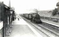 A parcels train runs through New Cumnock on 29 July 1961 behind <I>Crab</I> 2-6-0 42831.  <br><br>[G H Robin collection by courtesy of the Mitchell Library, Glasgow 29/07/1961]