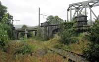 As in France there are many Belgian lines that have closed but the formations and trackwork are intact. This view from the closed Givey to Dinant line looks towards Dinant on 8th September 2017 with the still operational line from Libramont above coming in at high level from the River Meuse bridge at Anseremme. The two lines join a short distance further north. <br><br>[Mark Bartlett 08/09/2017]