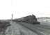 Standard class 5 4-6-0 73104 with a St Enoch - Largs train north of Glengarnock the summer of 1959. [Ref query 1115]<br><br>[G H Robin collection by courtesy of the Mitchell Library, Glasgow 14/07/1959]