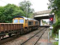 The 0740 (Sunday) Cambuslang - Millerhill ballast train runs south past Newcraighall station on 17 September 2017 behind GBRf 66741 <I>'Swanage Railway'</I>.<br><br>[John Furnevel 17/09/2017]