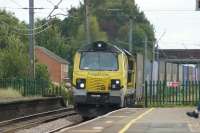 Freightliner 70010 heads for Scotland with a container service at Leyland on 16 September 2017.<br><br>[John McIntyre 16/09/2017]