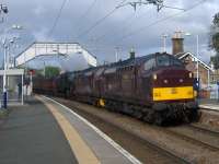 On 3rd October 2017 WCRC 37669 accelerates classmate 37516 and Black 5 44871, together with the air-braked Jacobite stock, through Cardross enroute to Carnforth.  37516 was dead in tow having failed at Glen Douglas the previous day and requiring 37669 to be sent north from Carnforth to effect a recovery. <br><br>[Malcolm Chattwood 03/10/2017]