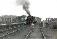 A Banff - Tillynaught train arrives at Ladysbridge station on 18 August 1960 hauled by BR Standard class 2 2--6-0 no 78054.  <br><br>[G H Robin collection by courtesy of the Mitchell Library, Glasgow 18/08/1960]