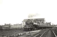 BR Standard 2-6-4T 80127 passing Port Eglinton Junction on 5 May 1956 with a Saturday service to Largs. The class 4 tank locomotive had arrived at Corkerhill new from Brighton Works 6 months earlier and would remain there until its eventual withdrawal by BR in the summer of 1964.<br><br>[G H Robin collection by courtesy of the Mitchell Library, Glasgow 05/05/1956]