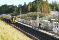 The single platform at Eskbank is lit by a low September sun on the morning of 14 September 2017 as the 0924 Edinburgh – Tweedbank arrives to pick up a solitary passenger.<br><br>[John Furnevel 14/09/2017]