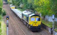 The 1031 Millerhill SS - Keith Loop, photographed running between Niddrie South and Niddrie West Junctions on 8 October 2017. Freightliner 66597 is at the head of the train of concrete sleepers, with 66952 bringing up the rear.<br><br>[John Furnevel 08/10/2017]