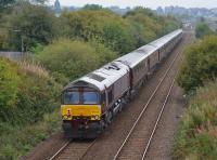 GBRf 66743 brings up the rear of the 'Royal Scotsman' as it approaches Cowdenbeath station with an Edinburgh - Aviemore private charter on 25th September 2017. 66746 is leading the train on this leg of the tour. A mineral branch once diverged to the left at this location. <br>
<br>
<br><br>[Bill Roberton 25/09/2017]