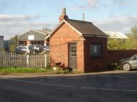 The former Flaxton Station goods yard weighbridge office still stands proud on the south side of the York to Scarborough line, alongside Rice Lane level crossing to the south of Flaxton village, diagonally across from the extant former station. <br><br>[David Pesterfield 19/09/2017]