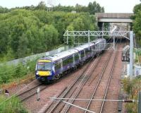 Looking north from Whitehill Road bridge towards Newcraighall North Junction on 24 September 2017 as the 0911 Edinburgh - Tweedbank takes the Borders line  shortly after restarting from Newcraighall station.<br><br>[John Furnevel 24/09/2017]