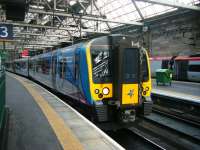 A Class 350 'Desiro' for Manchester Airport seen at Glasgow Central on the 6th Sept.<br><br>[Veronica Clibbery 06/09/2017]