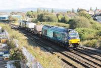 Another newly commissioned diesel, 68033, looks barely used as it leads a Sellafield to Heysham flask train into Morecambe on 28th September 2017. Once the driver has changed the points 68002 <I>Intrepid</I> will take the train down the branch to the power stations alongside Heysham Port.   <br><br>[Mark Bartlett 28/09/2017]