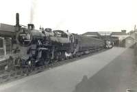 A Glasgow local waits to leave Kilmarnock in June 1954 behind BR Standard class 4 2-6-4T 80000.<br><br>[G H Robin collection by courtesy of the Mitchell Library, Glasgow 02/06/1954]