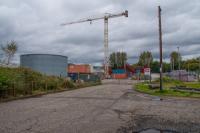 A view north from the site of the station throat at Kilbirnie, Caledonian. The passenger station was to the left and goods yard to the right - the buffer areas of both now being covered by Caledonian Court.<br><br>[Ewan Crawford 28/09/2017]