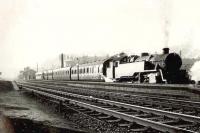 A local train in the bay platform at Barrhead on 24 October 1957 behind BR Standard tank 80027. <br><br>[G H Robin collection by courtesy of the Mitchell Library, Glasgow 24/10/1957]