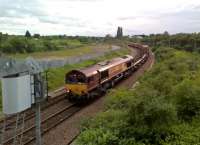 DB Cargo train 483K from Birch Coppice (a GBRf facility) to London Gateway about to pass over the West Coast Main Line at Nuneaton hauled by DBS 66034.<br><br>[Ken Strachan 12/06/2017]