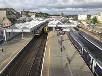 A typical early afternoon scene at Stirling in October 2017 featuring a variety of Diesel Multiple Units. Unseen in the distance behind the camera is an inexorable nightly advance of OHLE masts and bases which will soon change the view.<br><br>[Colin McDonald 05/10/2017]