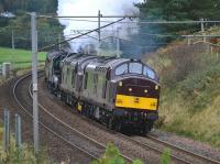 West Coast 37669 heading south from Abington after a stop in the U Loop. 37516 was <I>dead in train</I> (having run out of fuel the previous day) with a very alive Black 5 44871. The train was returning the second rake of coaches from Fort William to Carnforth on 3rd October 2017. The <I>Jacobite</I> service continues for two more weeks with the remaining rake. <br>
<br>
<br><br>[Bill Roberton 03/10/2017]