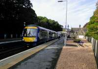 A Class 170 with a southbound service at Pitlochry on 4th October 2017. Will all 170s be banished when the HSTs come on stream next year? Let's see. 170s have been around in Scotland for (incredibly) 18 years. When first delivered they had payphones<br>
- which I never once saw used.<br>
<br>
<br><br>[David Panton 04/10/2017]