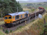 GBRf 66707 <I>Sir Sam Fay</I> heads north from Crawford with a Carlisle - Millerhill engineers train on 3rd October 2017.<br>
<br>
<br><br>[Bill Roberton 03/10/2017]