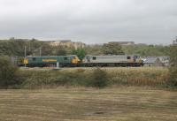 Still operating in Freightliner Grey livery, 90044 leads 90046 and a Coatbridge to Daventry liner train south through the Oubeck Loops on 4th October 2017. <br><br>[Mark Bartlett 04/10/2017]