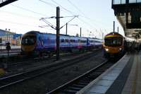 Train arriving from and train departing to Scarborough. TPE Class 185s meet at York on 18th September 2016.<br>
<br>
<br><br>[Colin Miller 18/09/2016]