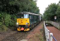 GBRf 73971 slows to call at Garelochhead with the Fort William bound sleeper service on 1st August 2017. <br><br>[Mark Bartlett 08/10/2017]