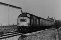 Class 37 37260 Radio Highland approaches Elgin West bos with an afternoon train on the most 8th day of the 8th month, 1988.<br><br>[Crinan Dunbar 08/08/1988]