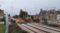 A view of the work extending the loop with new track at The Wards, Elgin.<br>
<br>
Wards crossing almost done. Signals being toppled.  Platform extensions not<br>
complete.<br>
<br>
The way the track machine (not pictured) had a smart Thomas Telford nameplate - possibly ex BR. (Does anyone know?)<br><br>[Crinan Dunbar 17/10/2017]