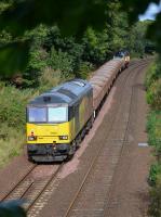 Not something you see every day.  Colas 70804 and 60021 climb away from Dalgety Bay / pass the site of Donibristle siding, with a Millerhill - Elgin ballast on 16 September.<br><br>[Bill Roberton 16/09/2017]