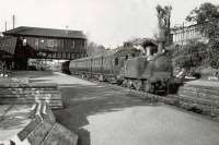 A McIntosh ex-Caledonian 0-4-4T, carrying LMS no 15029 calls at Strathbumgo with an East Kilbride train in July 1948, during the first year of the newly nationalised British Railways.  <br><br>[G H Robin collection by courtesy of the Mitchell Library, Glasgow /07/1948]