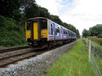 A Northern service to Colne descends Hoghton bank heading to the next stop at Pleasington.<br><br>[John McIntyre 14/07/2007]