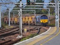 DRS 66431 nears Carstairs Station with a Mossend to Carlisle engineers train on 3rd October 2017.<br>
<br>
<br><br>[Bill Roberton 03/10/2017]
