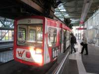 Boarding the Wuppertal in its large glazed station area.<br><br>[John Yellowlees 15/09/2017]