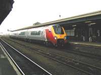 A Virgin Voyager forming a Southampton - Newcastle Central service stands at Reading in May 2002.<br><br>[Ian Dinmore 24/05/2002]
