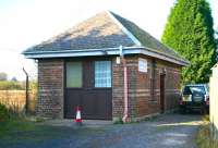 Surviving building standing on the site of the up platform of the former Loch Leven station, seen here in October 2007 in use by a local plumbing business. The station closed to passengers in 1921, although the line itself survived until 1970.<br><br>[John Furnevel 23/10/2007]